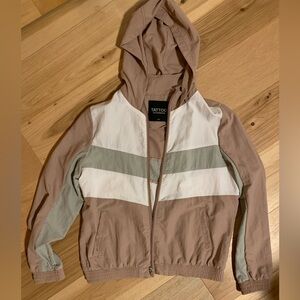 Hooded shell / windbreaker jacket. Brand new without tags
